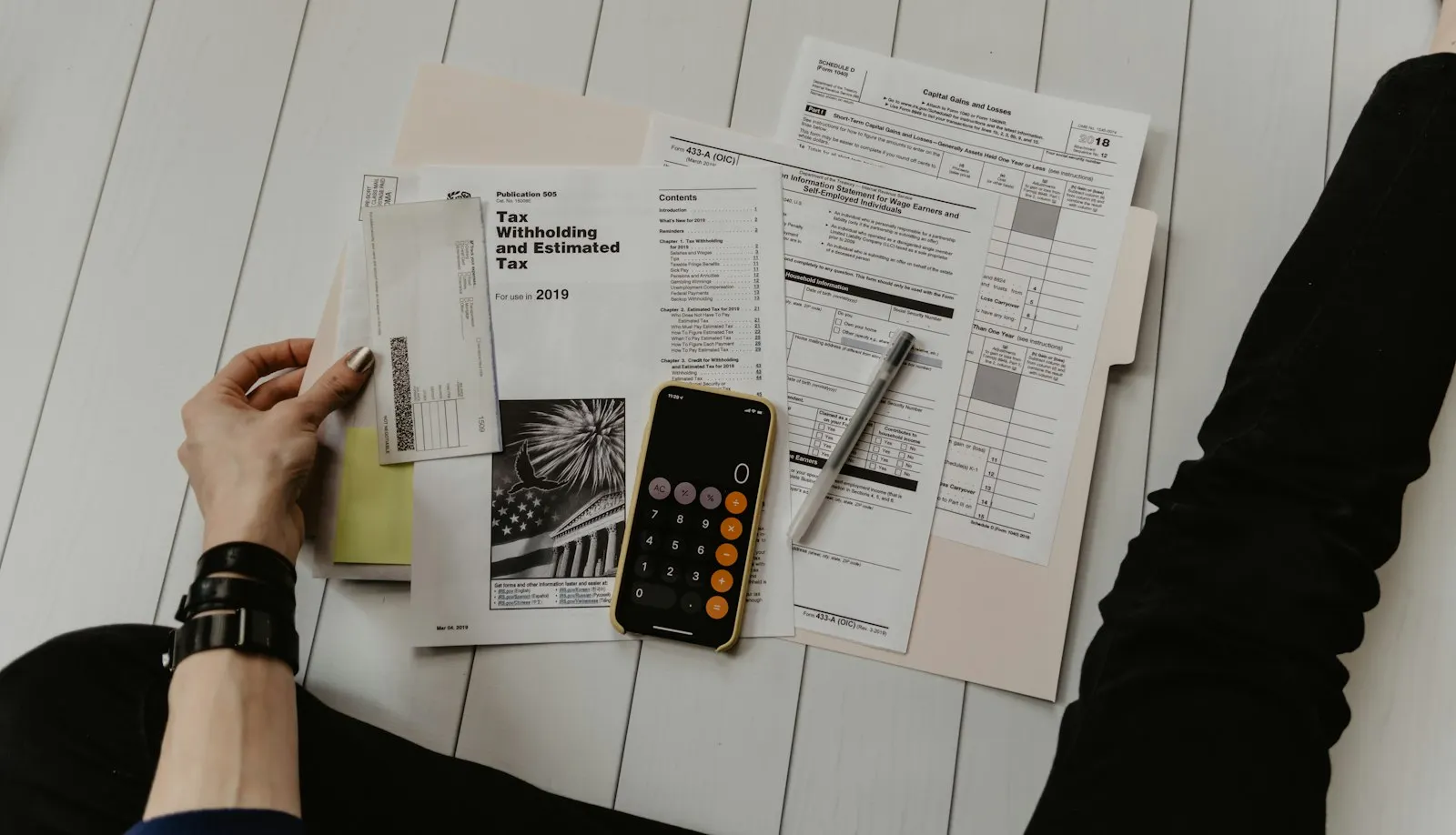 Receipts and a calculator on a desk